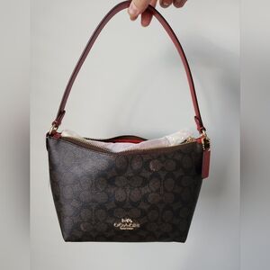 NWT Coach Zip Top Shoulder Bag In Signature Canvas CX610